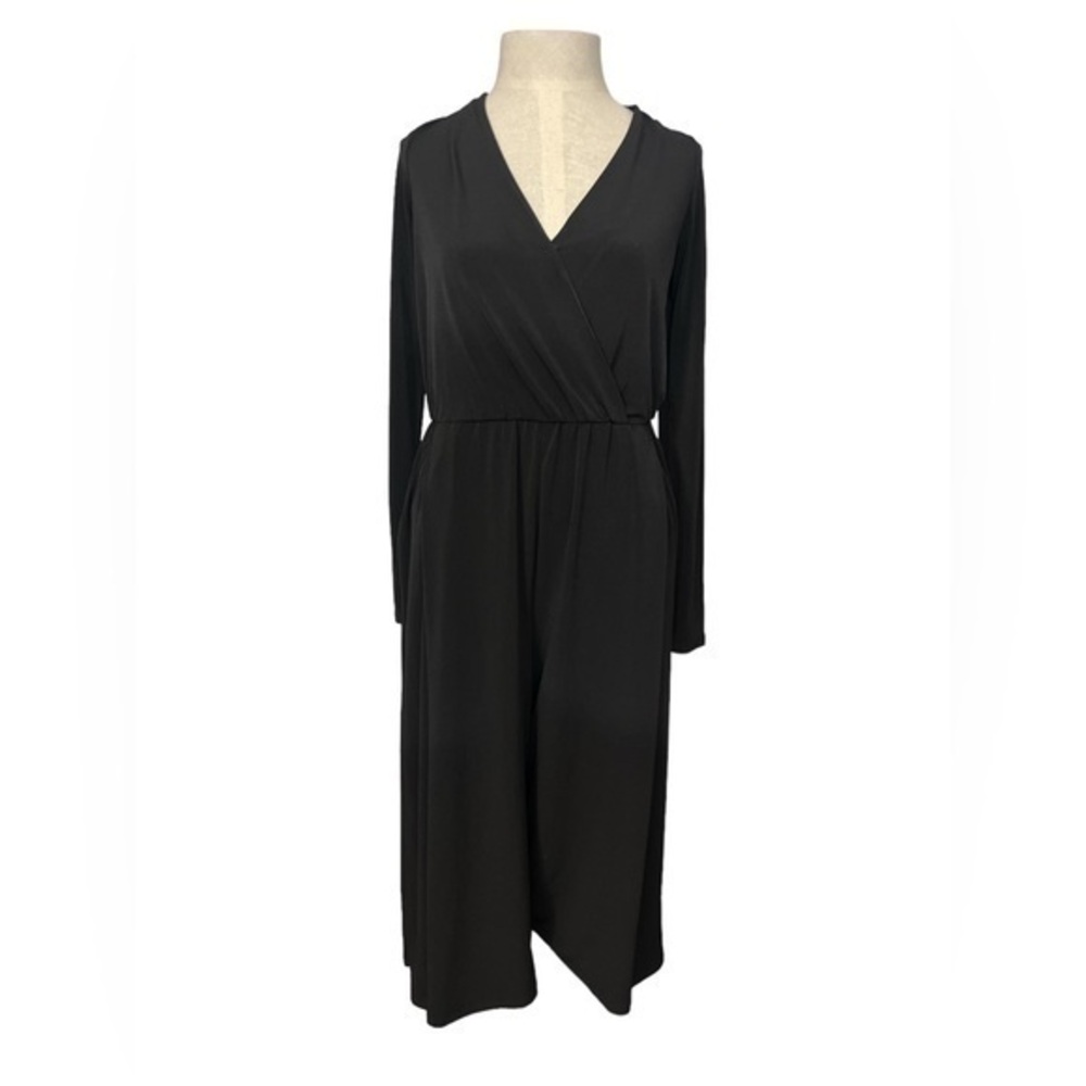 New BCBGeneration long sleeve black jumpsuit size small.NWT